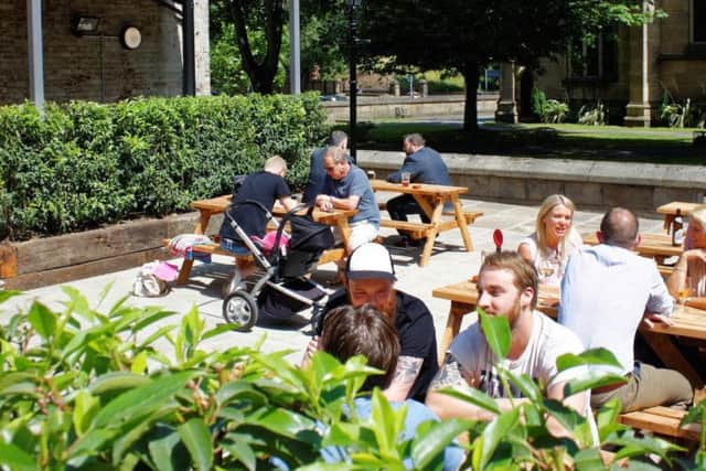 The Lamb and Flag pub, located on Church Row in Leeds, boasts a bustling beer garden which is popular during spring and summer