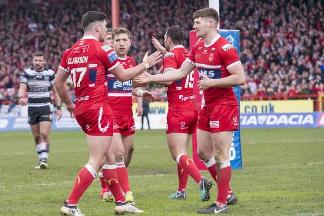 Ryan Shaw celebrates scoring against Hull FC.