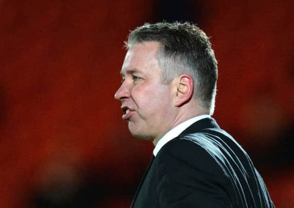 Darren Ferguson: Looking up.