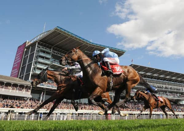 York winner: Nakeeta and Callum Rodriguez, left, beats Flymetothestars and Luke Morris to win the Ebor.