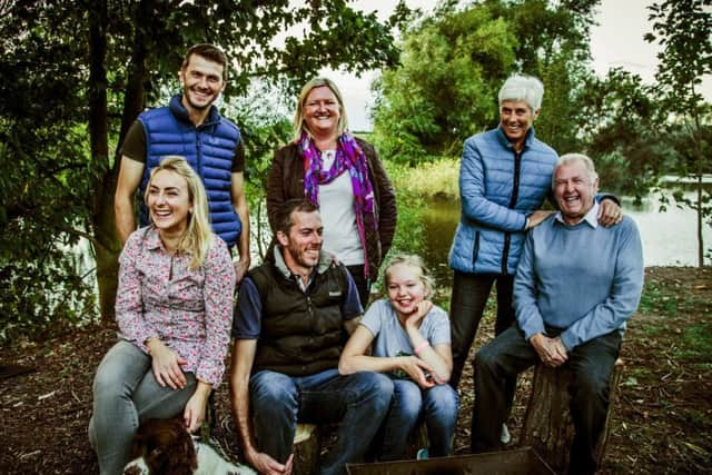 The  Lee family next to Kingfisher Lakes.