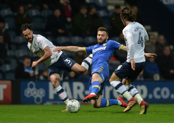 Stuart Dallas stretches for the ball past Greg Cunningham and Ben Pearson. 
Picture: Bruce Rollinson