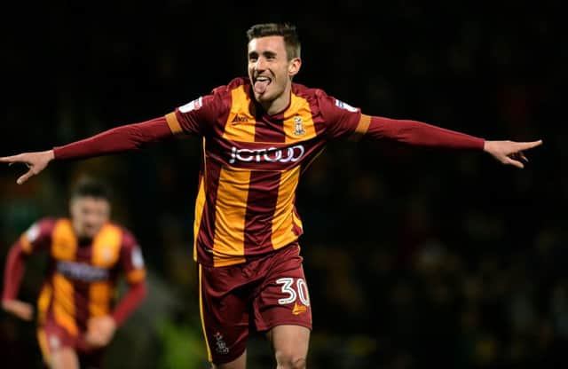 Matthew Lund celebrates scoring for Bradford City against Portsmouth last night (Picture: Bruce Rollinson).