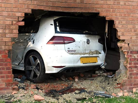 How the car ended up in the front room of the house.