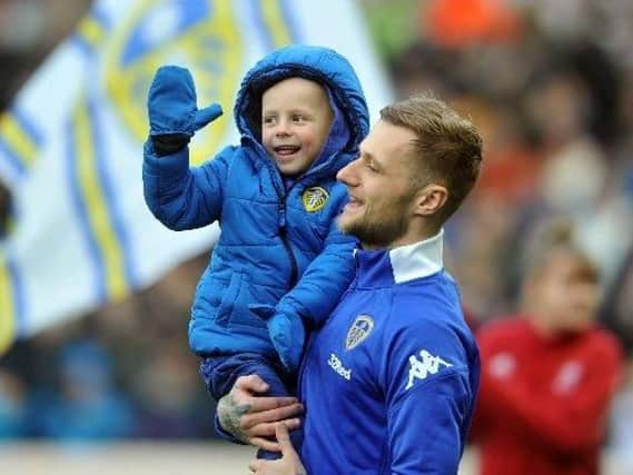 Toby Nye with Leeds United captain Liam Cooper