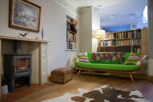 The sitting area now open to the dining kitchen with Ercol daybed that was left by the previous owners.