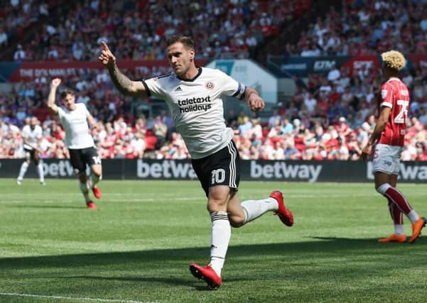 Billy Sharp celebrates scoring Sheffield United's second goal at Ashton Gate. Picture: Simon Bellis/Sportimage