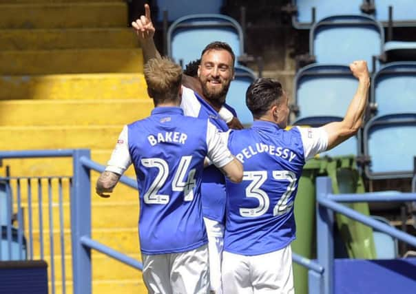 TOP MAN: Atdhe Nuhiu celebrates one of his three goals at Hillsborough on Sunday afternoon against Norwich City. Picture:  Steve Ellis