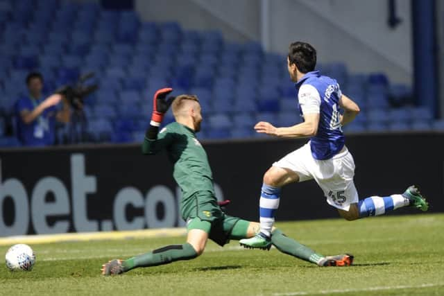 GET IN: Fernando Forestieri beats Norwich City goalkeeper Angus Gunn for the Owls' second goal. Picture: Steve Ellis