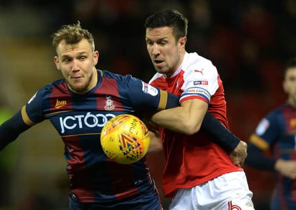 Rotherham's Richard Wood battles with Bradford City's Charlie Wyke in January this year.  Picture: Bruce Rollinson