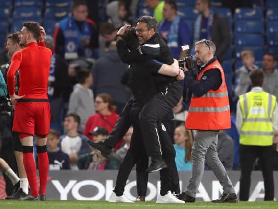 MIRACLE: David Wagner celebrates after the final whistle at Stamford Bridge after Huddersfield Town's 1-1 draw against Chelsea ensured the Terriers' Premier League survival. Picture: PA.