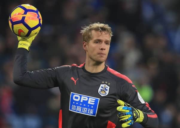 Huddersfield Town goalkeeper Jonas Lossl: Stunning save.