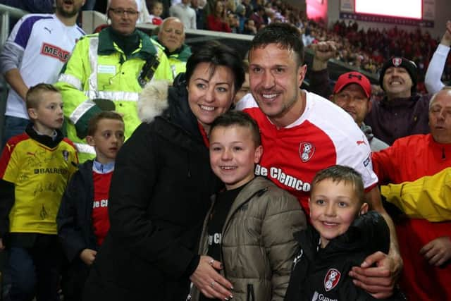 Rotherham United's Richard Wood celebrates with his family.