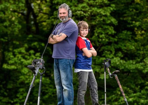 Andy Firth and his son Ryan, 10, found a 13th to 14th century gold medieval ring brooch while out metal detecting