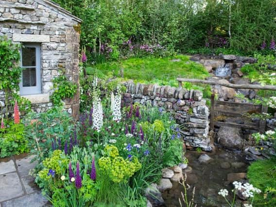 The garden is themed around the drystone buildings of the Dales