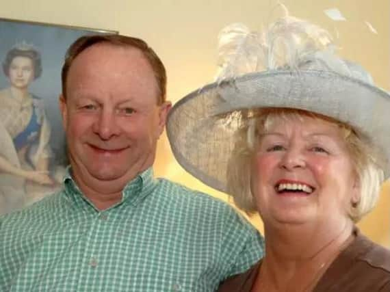 Ray and Barbara preparing to meet the Queen in 2008.