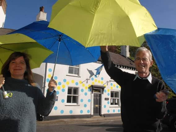 Tony and Lori Handley outside Spotty House in Knaresborough