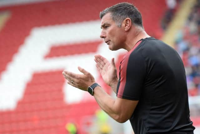 Rotherham United assistant manager Richie Barker: Glad he returned.